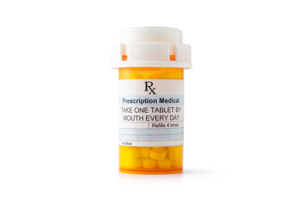 prescription drugs - vitamin pill vitamin e isolated text imagens e fotografias de stock