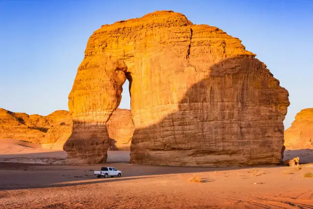 Stock photograph of the landmark Elephant Rock near Al Ula, Medina Region, Saudi Arabia on a sunny day.