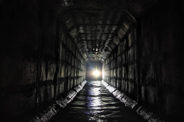 istock Dirty urban sewage flowing through rectangular sewer tunnel under Moscow 1138502051