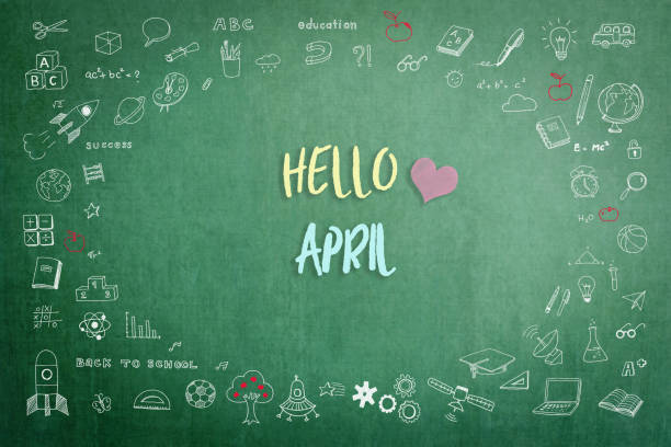 istock Hello April greeting on green school teacher's chalkboard with creative student's doodle of learning education graphic freehand illustration icon for back to school month concept 1138504325