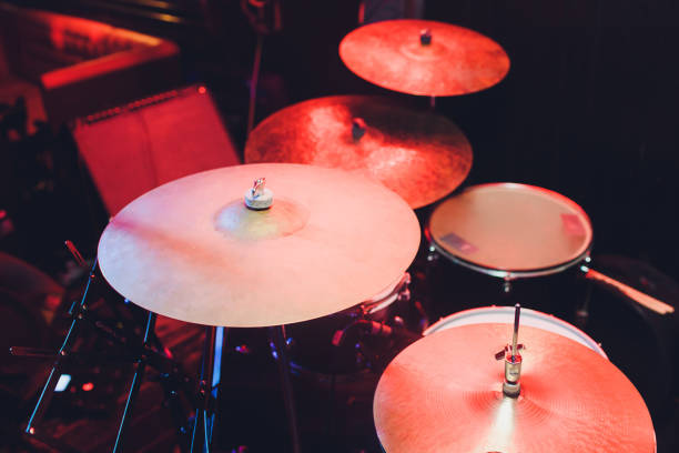 istock Modern drum set shot in smoky dark studio. 1138504452