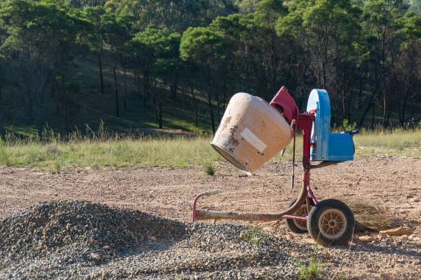 Electric Concrete Mixer Portable Machine, wheelbarrow and shovel.