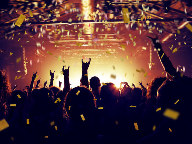 istock Live music crowd with confetti falling 1138506118