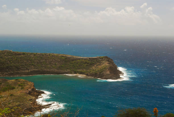 istock Beautiful blue waters of Antigua under a sunny sky. 1138514953