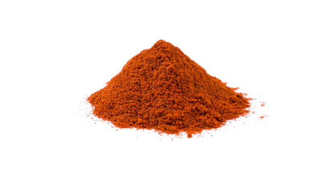 istock milled or ground paprika or red pepper heap isolated on white background. front view 1138517394