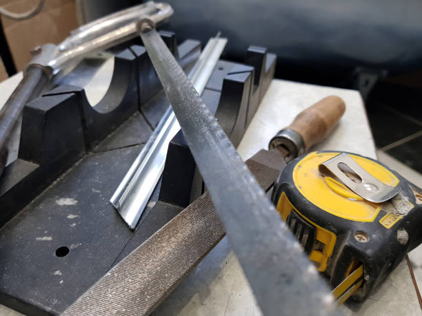 istock Repair - building with tools, tape measure, miter box, file, hacksaw, ruler 1138517674
