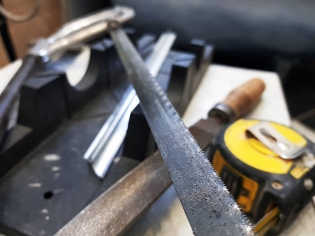 istock Repair - building with tools, tape measure, miter box, file, hacksaw, ruler 1138517698