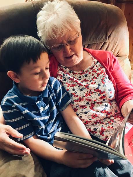 istock Grandma and Grandson Reading a Book 1138518365