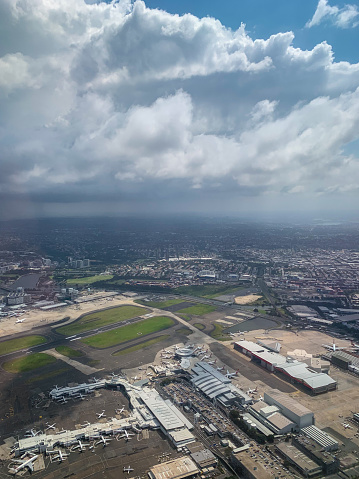 Aerial view over Sydney Airport as a storm approaches