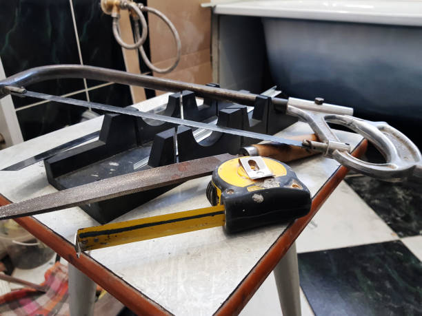 istock Repair - building with tools, tape measure, miter box, file, hacksaw, ruler 1138526843