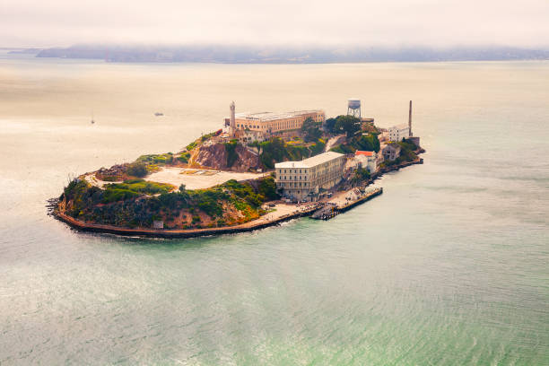 Alcatraz aerial view- San Francisco View of Alcatraz Island from above with copy space alcatraz island stock pictures, royalty-free photos & images