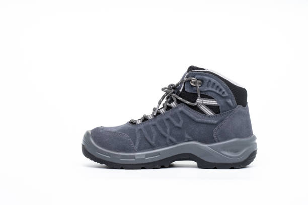 istock A pair of new hiking boots on white background 1138532314