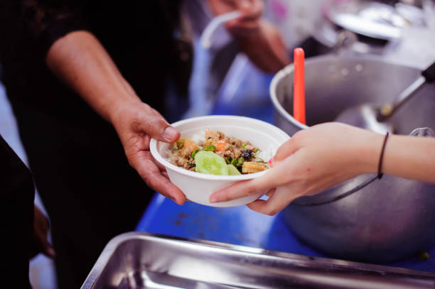 istock People have requested food from donations: the concept of hope 1138532499