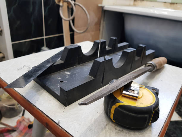 istock Repair - building with tools, tape measure, miter box, file, hacksaw, ruler 1138534878