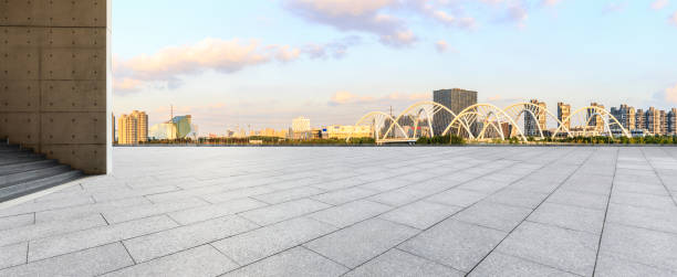 istock Empty floor and city skyline panorama with bridge construction in shanghai at sunset 1138539217