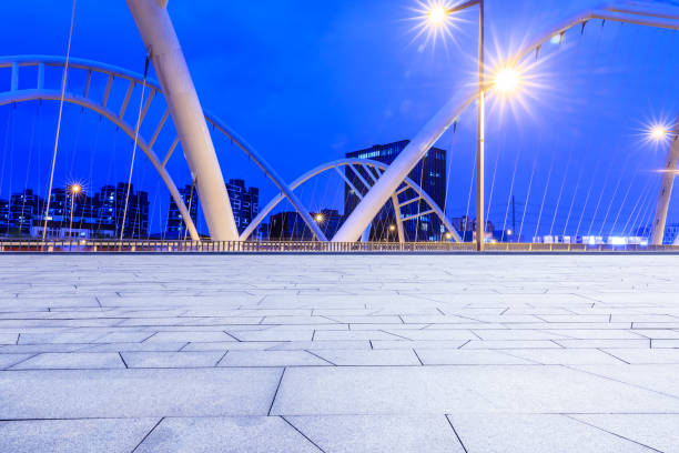 istock Empty square floor and bridge construction in shanghai at night 1138539540