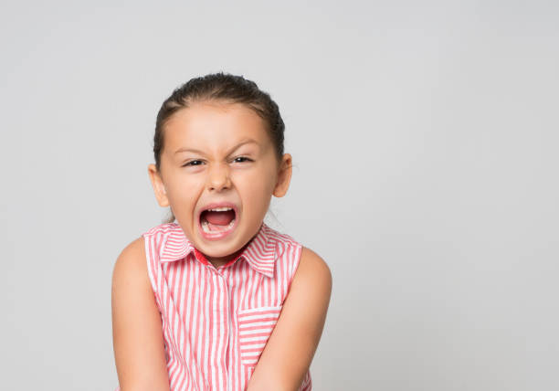 Little girl making a face