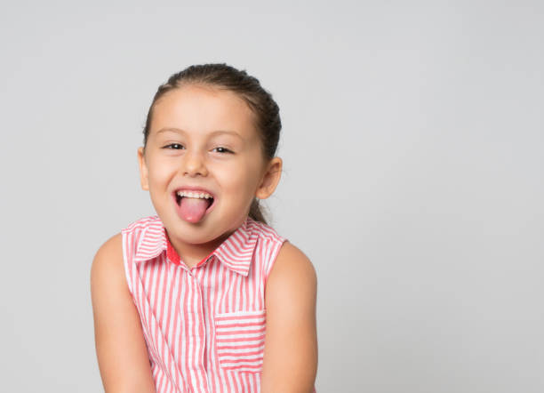 istock Little girl making a face 1138542099