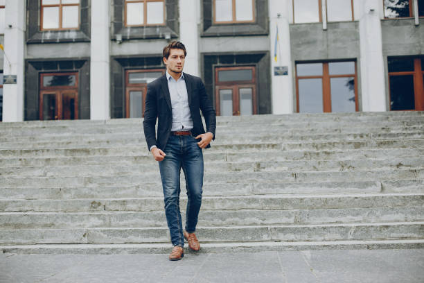 istock Handsome businesman in a summer city 1138550856