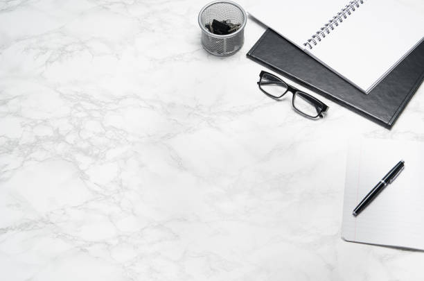 istock White office desk table with supplies copy space. Flat lay 1138550883