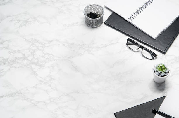 istock White office desk table with supplies copy space. Flat lay 1138550887