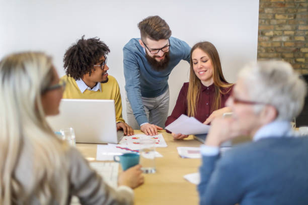 istock Multi-generation and ethnic group of colleagues at meeting 1138554446