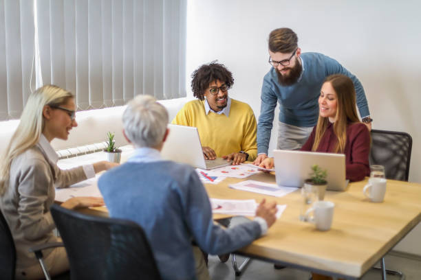 istock Multi-generation and ethnic group of colleagues at meeting 1138554449