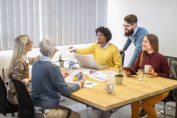 istock Multi-generation and ethnic group of colleagues at meeting 1138555079