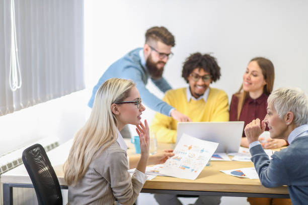 istock Multi-generation and ethnic group of colleagues at meeting 1138555147