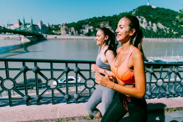 istock Friends jogging in the city 1138555309