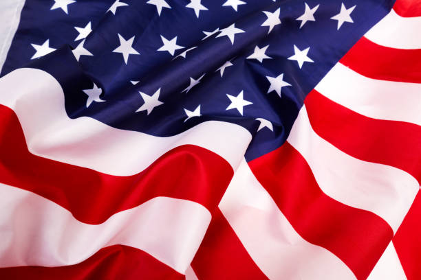 istock american flag isolated on white background - Image 1138559887