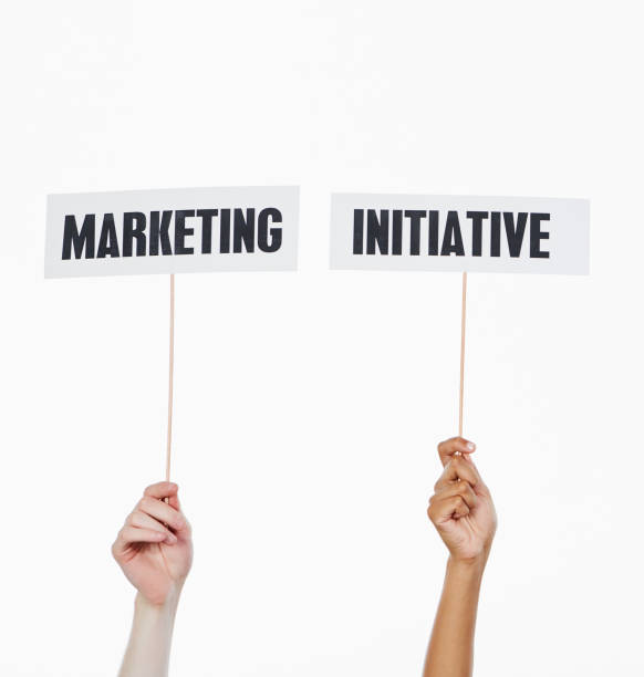 istock Two hands hold up signs reading 