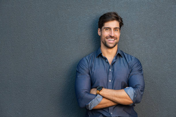 istock Smiling successful man with crossed arms 1138562954