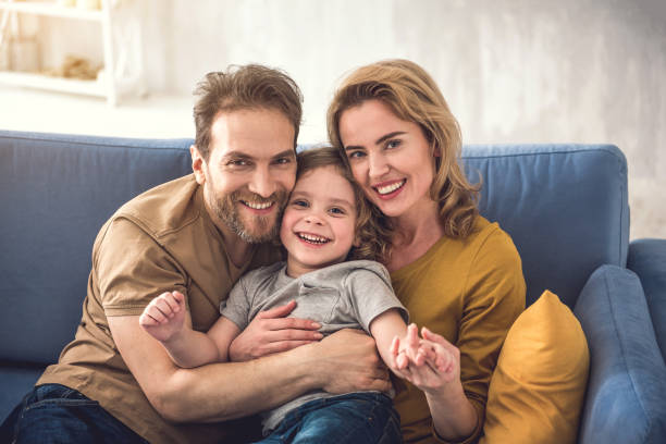 istock Loving parents enjoying time with son 1138568093