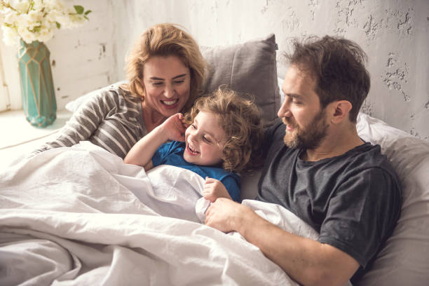 istock Blessed family is starting new day jointly in bright dormitory 1138568116