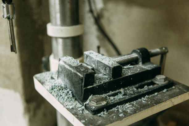 istock Shop with machines for wood processing. Machine parts in operation, with chips. 1138571635