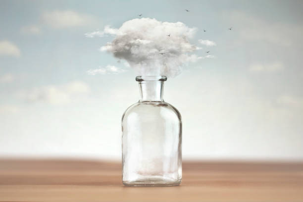 conceptual image of freedom with a cloud coming out of a vase that contained it conceptual image of freedom with a cloud coming out of a vase that contained it brain jar stock pictures, royalty-free photos & images