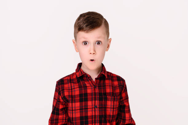 istock The little boy with expressive emotion on a white background 1138575913