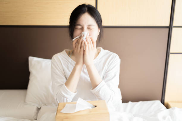 istock Young Chinese women are sick 1138577304