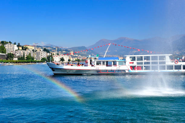 istock Fountain and Rainbow at Geneva Cityscape Background, Switzerland 1138577388