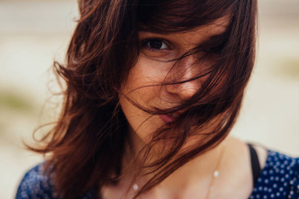 istock Young beautiful girl smiling at camera 1138578488