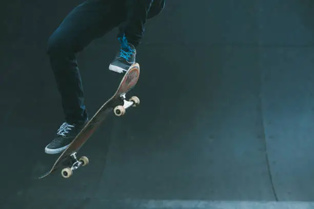 Photo of urban skater trick skate ramp man jumping