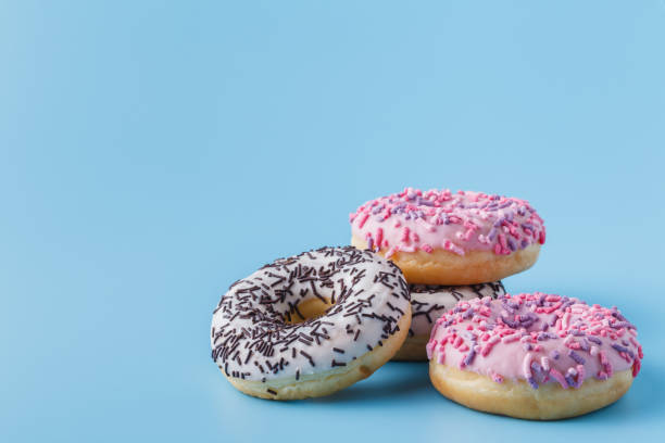 istock unbalanced diet treats cookies and donuts 1138584277