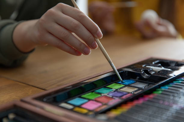 istock Girl using watercolours to paint 1138587137