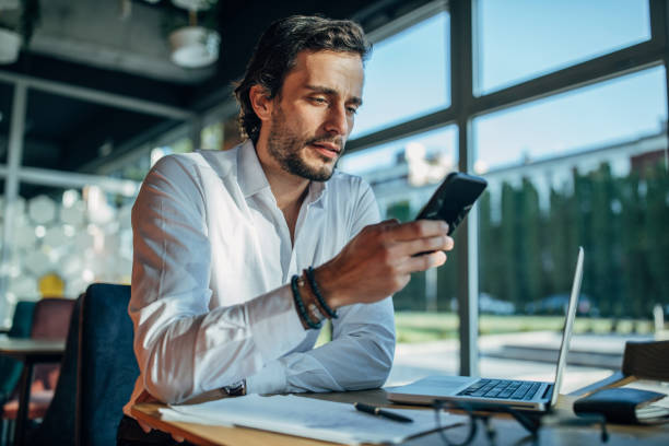istock Handsome businessman in cafe alone 1138587651