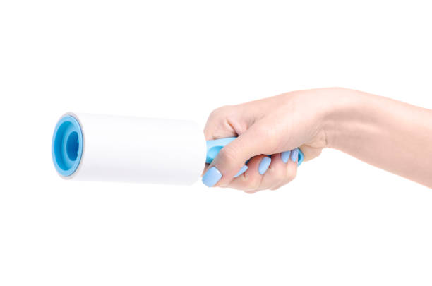 istock Adhesive roller for cleaning clothes in hand 1138589338