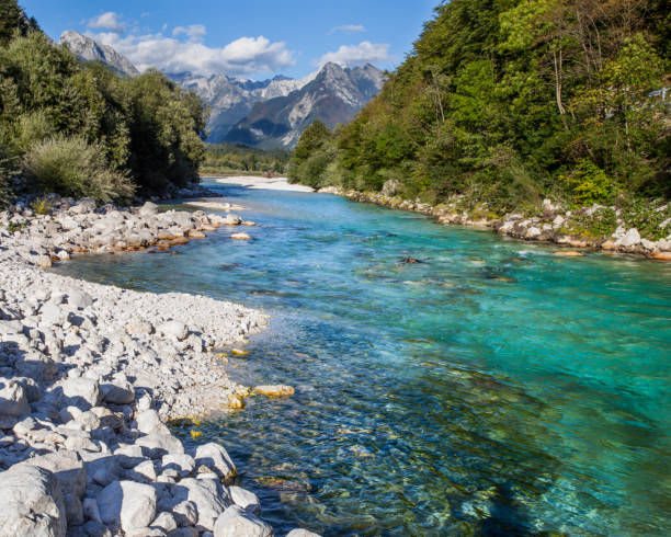 Soca valley with mountains in the background Soca valley with mountains in the background soca valley stock pictures, royalty-free photos & images