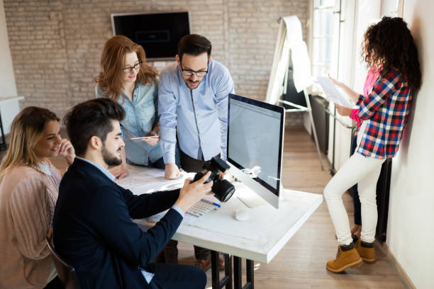 istock Picture of young attractive designers looking at camera 1138591941