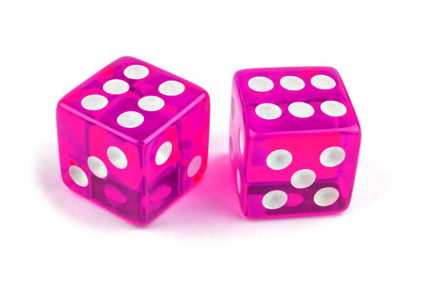istock Two pink glass dice isolated on white background. Six and six. 1138592750