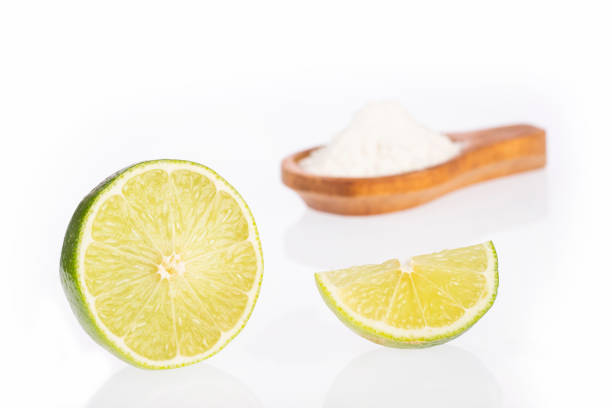 istock Baking soda (sodium bicarbonate) and lemon - Citrus × latifolia 1138592844